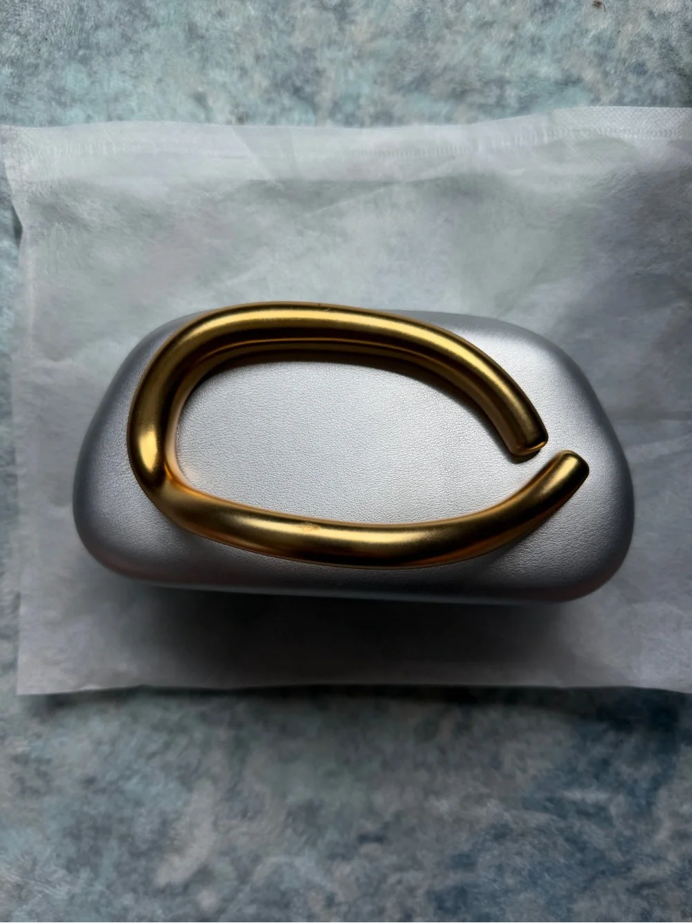 Handheld Clutch in Light Gray with Gold Accent Hand Inset